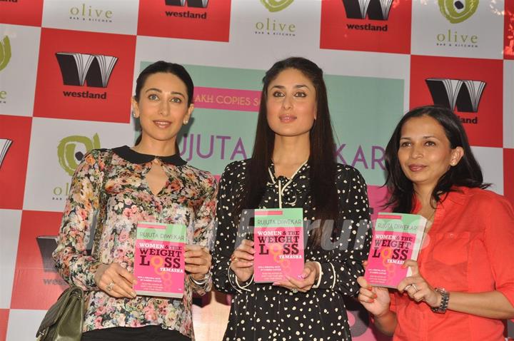 Karisma Kapur & Kareena Kapoor unveiling the book of 'Women & The Weight Loss Tamasha' written by Rujuta Diwekar at Olive Bar