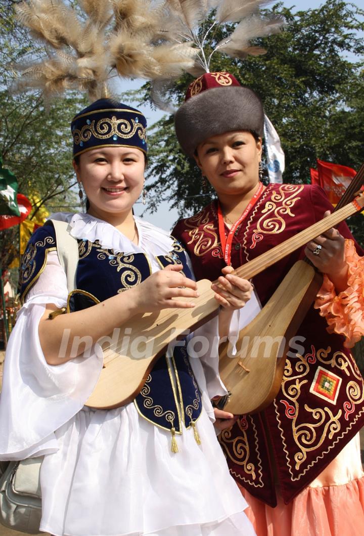 Folk artists from Kazakhstan at the 26 th Surajkund Craft Mela ,Faridabad on Wednesday-IANS Photo by Amlan Paliwal.