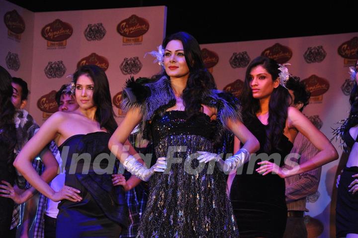 Models walk the ramp for McDowell’s Signature Premier Indian Derby 2012 fashion show at RWITC