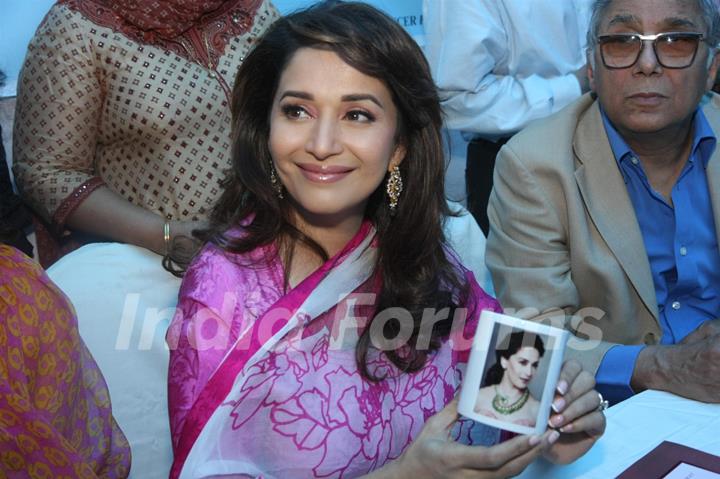 Madhuri Dixit Nene interacts with Cancer affected little patients on World Cancer Day organised by Pawan Hans at Juhu, Mumbai