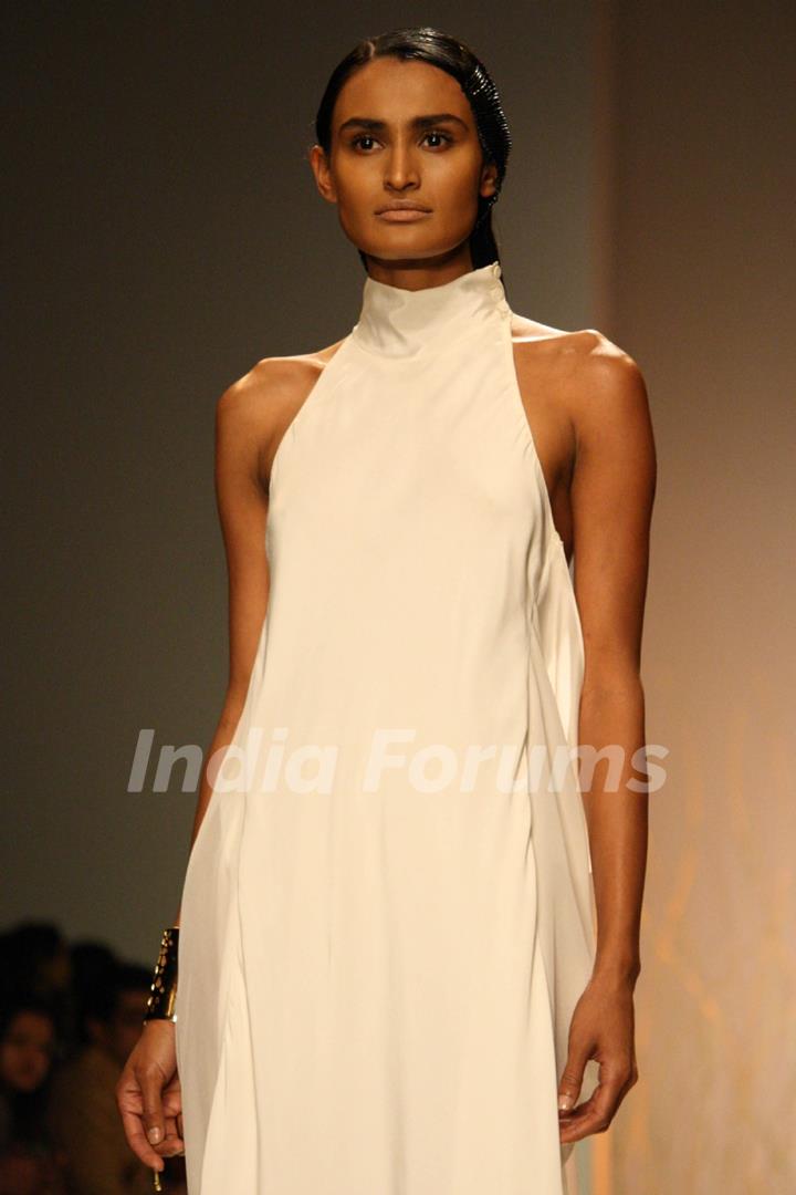 A model displays a creation by designer Anand Kabra at the Wills Lifestyle India Fashion week 2012,in New Delhi on Wednesday. .