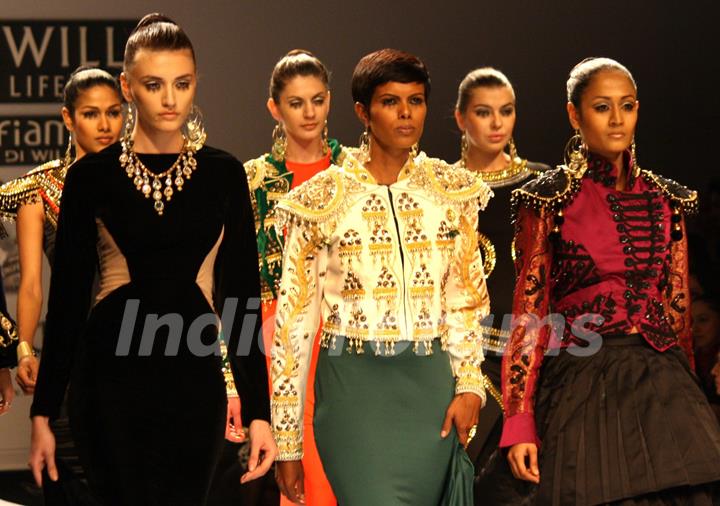 Models displays  creations by designer Preeti Chandra at the Wills Lifestyle India Fashion week 2012,in New Delhi on Wednesday. .