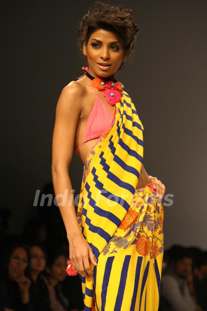 A model displays a creation by designer Anupama Dayal at the Wills Lifestyle India Fashion week 2012,in New Delhi on Wednesday. .