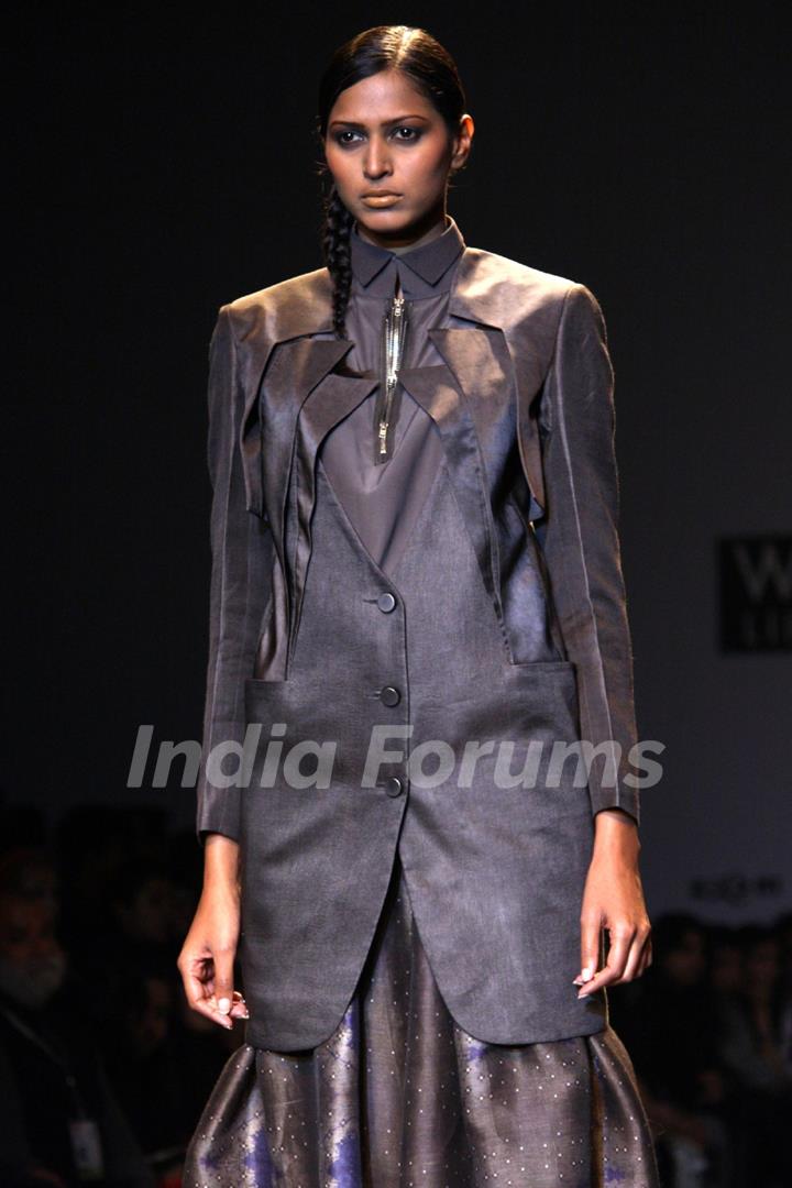 A model displays a creation by designer Arjun at the Wills Lifestyle India Fashion week 2012,in New Delhi .