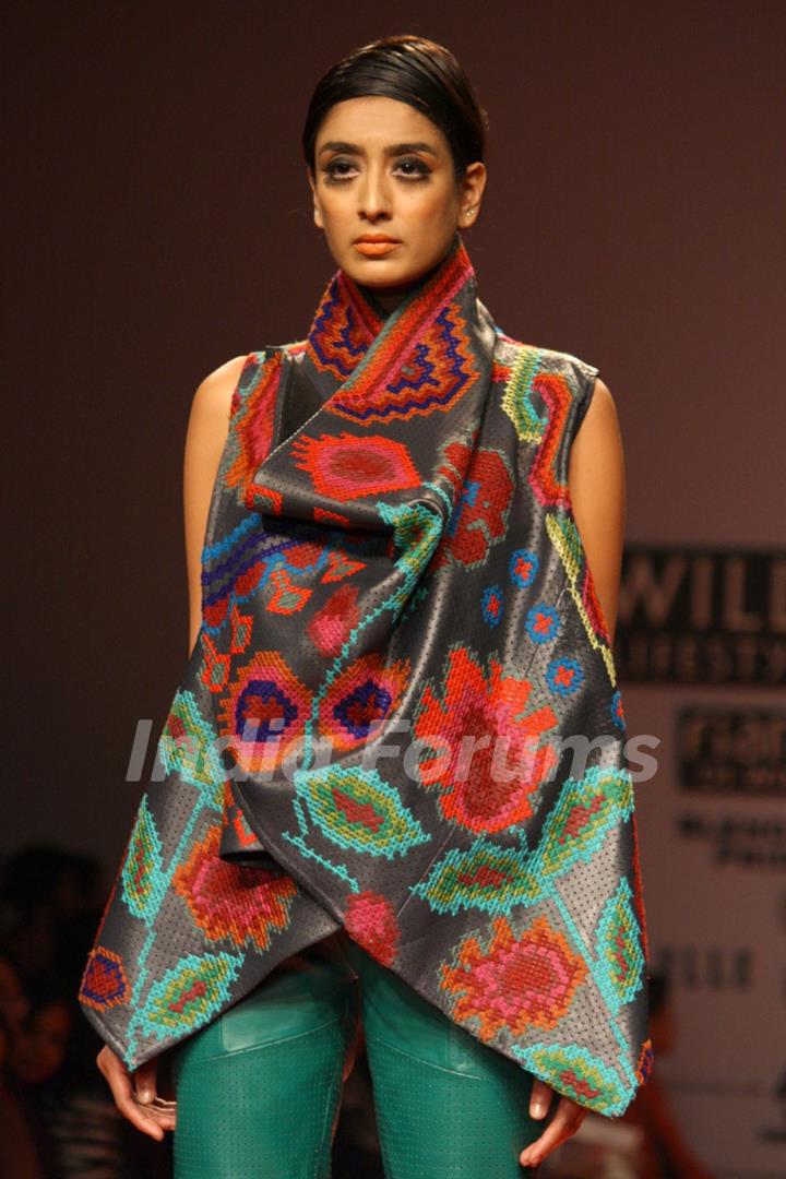 A model displays a creation by designers Pankaj and Nidhi at the Wills Lifestyle India Fashion week 2012,in New Delhi on Friday. .