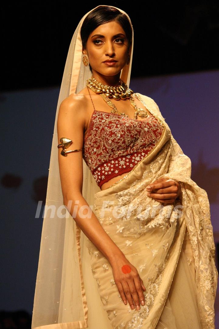 A model displays a creation by designer Rocky S at the Wills Lifestyle India Fashion week 2012,in New Delhi on Saturday. .
