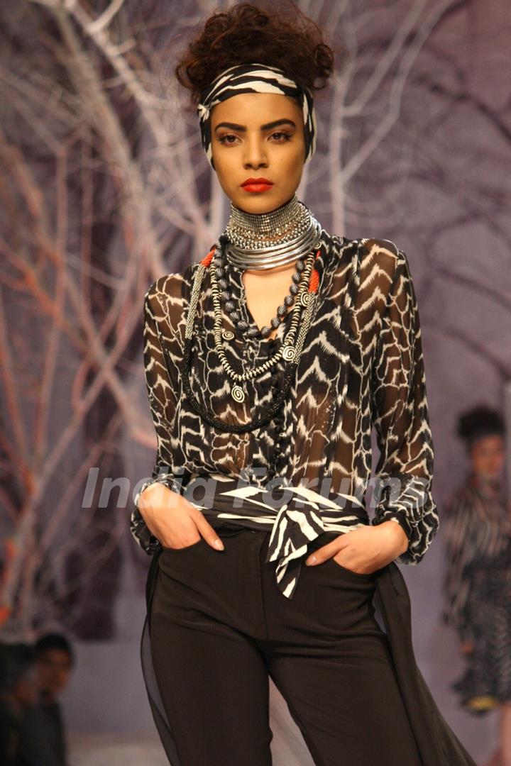 A model displays a creation by designer Payal Jain at the Wills Lifestyle India Fashion week 2012,in New Delhi on Saturday. .