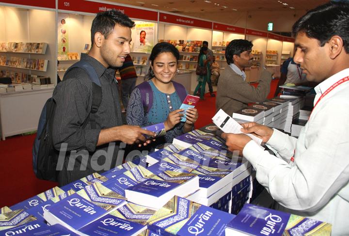 Free &quot;Quran&quot; distribution at a books stall at the 20 th World Book Fair, in New Delhi on Saturday. .