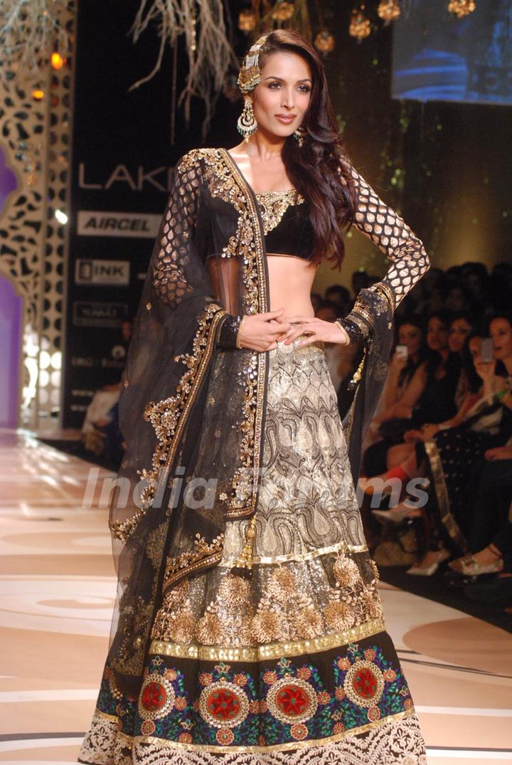 Malaika Arora Khan walk the ramp for designer Vikram Phadnis on day 1 of the Lakme Fashion Week at Grand Hyatt in Mumbai. .