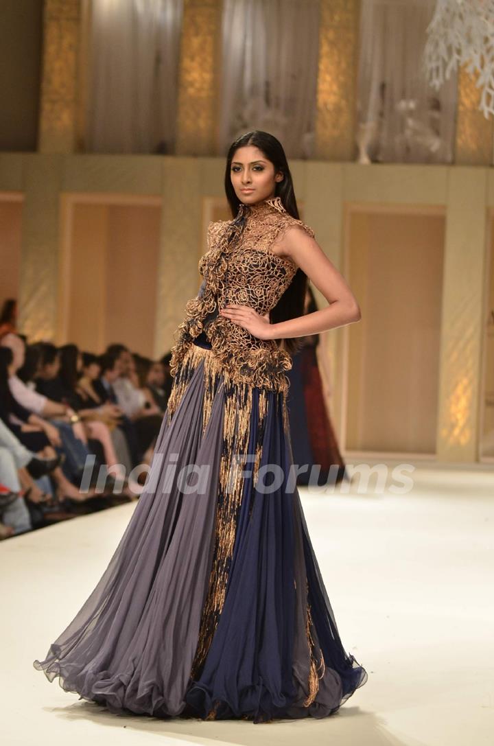 Model on the ramp for designer Rohit Bal on Lakme Fashion Week day 5 in Mumbai. .