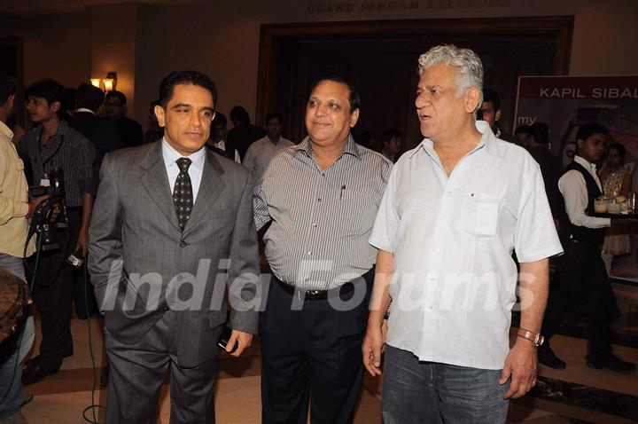 Celebs at Kapil Sibal book launch. Rishi Kapoor, Kader Khan, Javed Akhtar, Madhur Bhandarkar, Om Puri, Anupam Kher attended the launch party. .