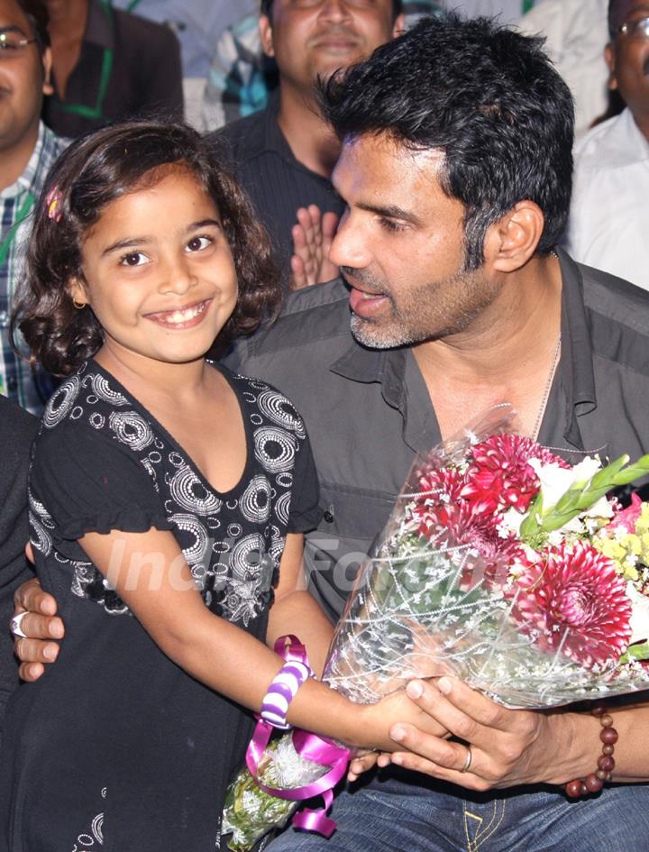 Bollywood actor Sunil Shetty with underprivileged children at the ChildFun day organized by ChildFund India, in New Delhi on Wednesday. .