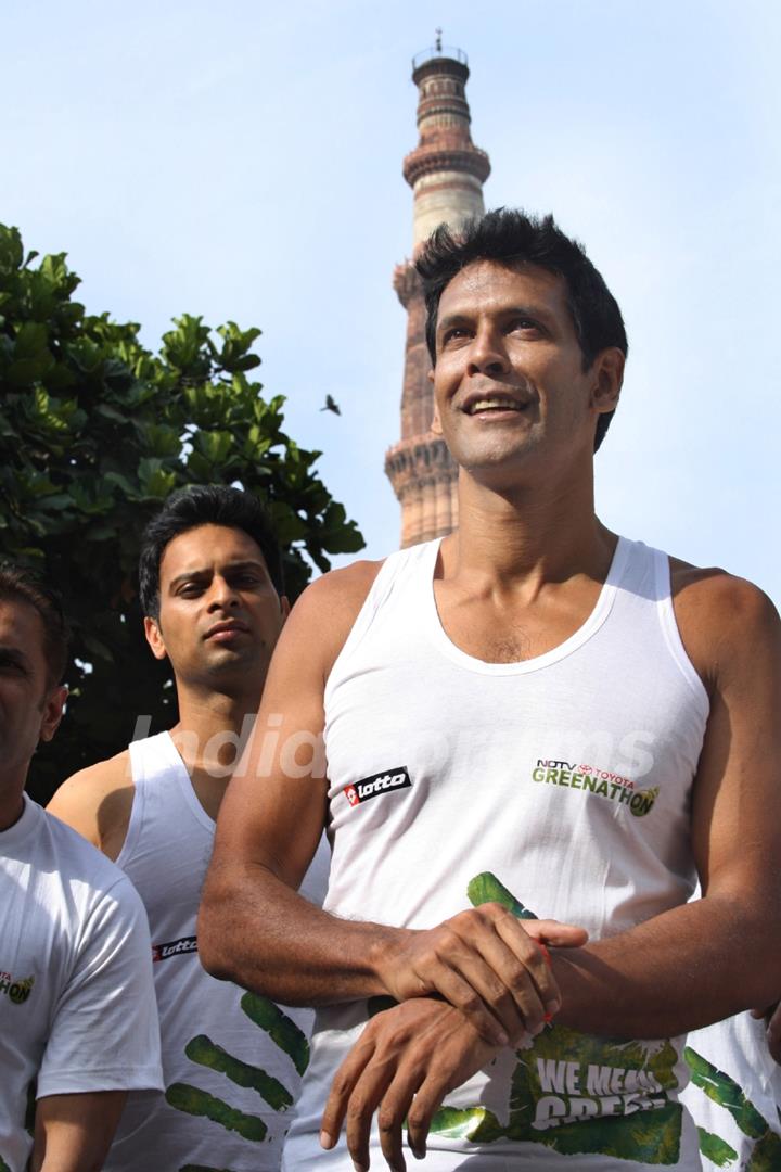 NDTV Green Runner Milind Soman starts his 1500 kilometers Run from Qutub Minar, New Delhi to Mumbai. .