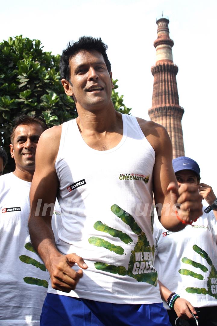 NDTV Green Runner Milind Soman starts his 1500 kilometers Run from Qutub Minar, New Delhi to Mumbai. .