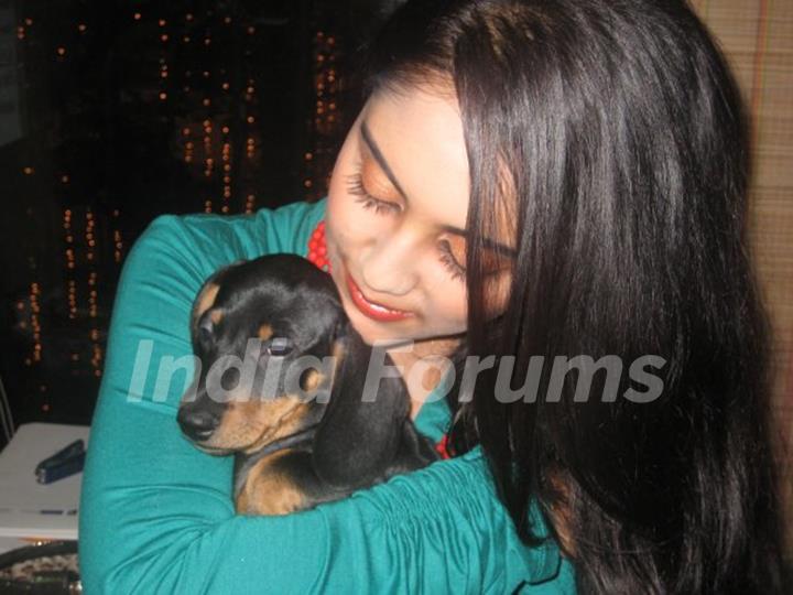 Aditi Tailing with dog