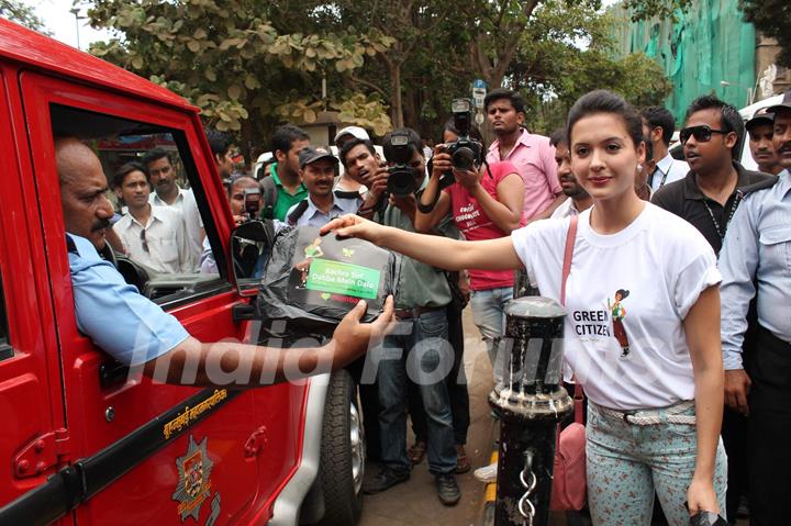 Bollywood actress Isha Sharwani supports the Go Green Initiative at CST in Mumbai