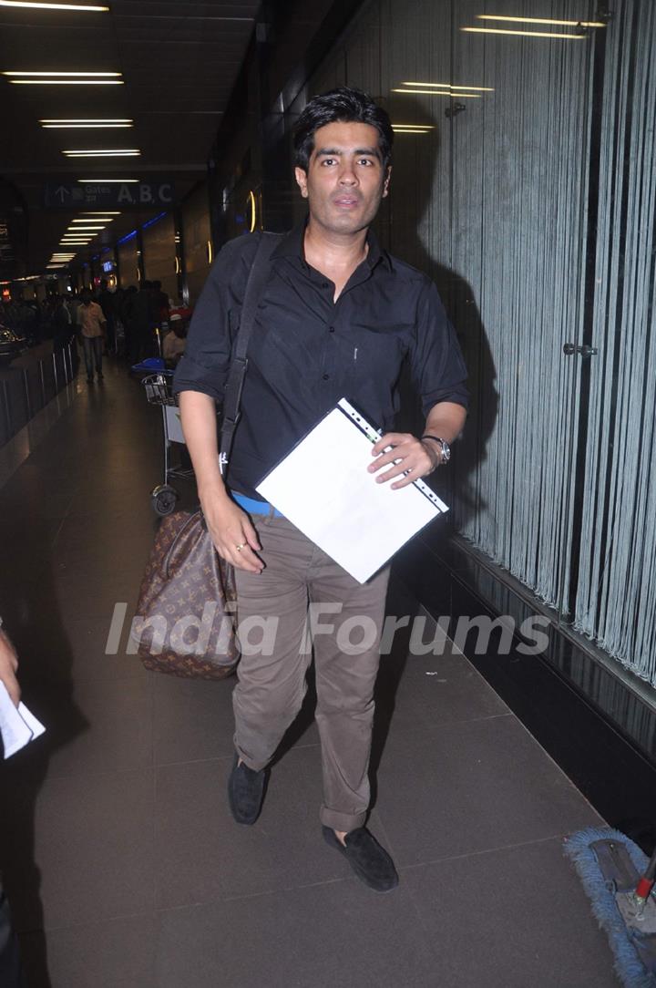 Designer Manish Malhotra leave for London at International Airport. .