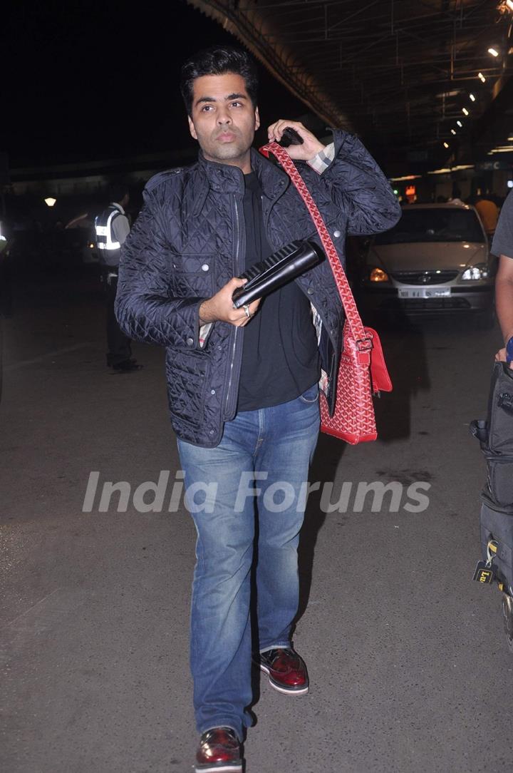 Bollywood  filmmaker Karan Johar leave for London at International Airport. .