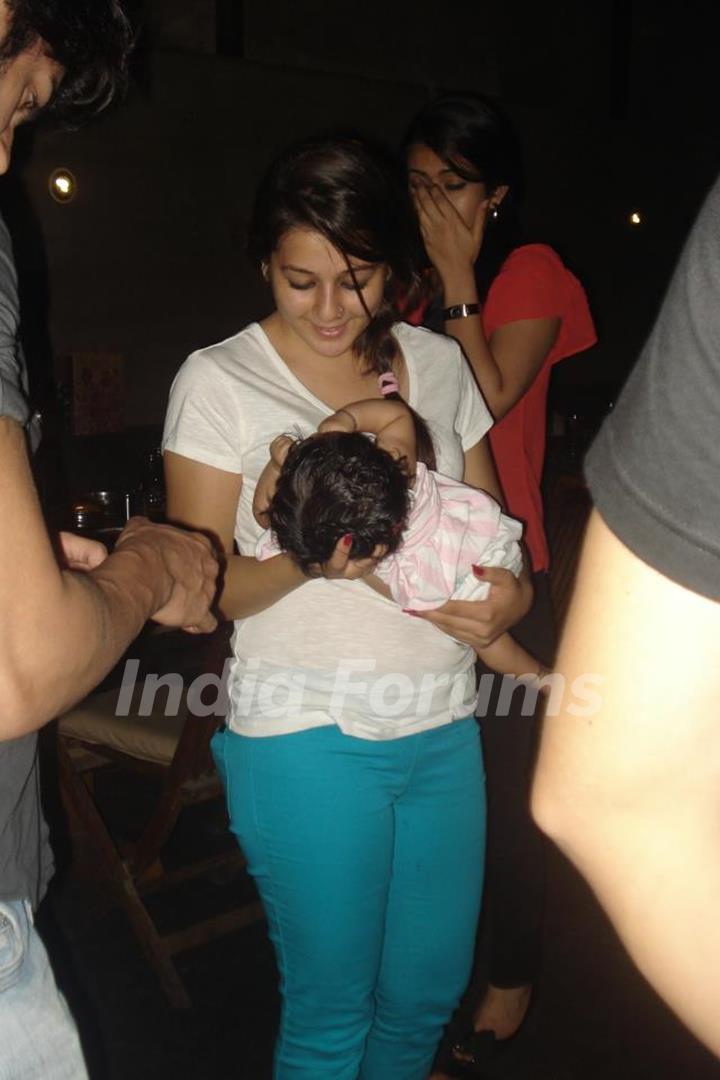 Priyal holding a baby