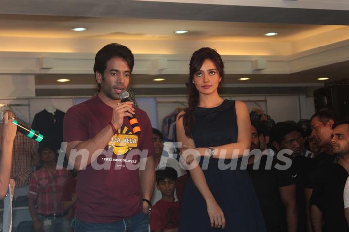 Bollywood actors Tusshar Kapoor & Neha Sharma poses during the Lawman Pg3 associates with Kya Super Kool Hain Hum in Mumbai