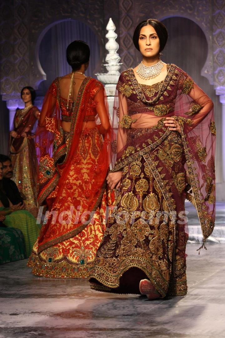 Models showcases a creation by designer JJ Valaya show at the Delhi Couture Week 2012, in New Delhi on Wednesday. .