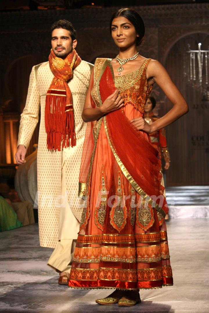 Models showcases a creation by designer JJ Valaya show at the Delhi Couture Week 2012, in New Delhi on Wednesday. .