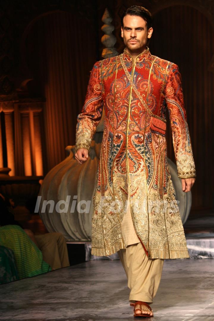 A model showcases a creation by designer JJ Valaya show at the Delhi Couture Week 2012, in New Delhi on Wednesday. .