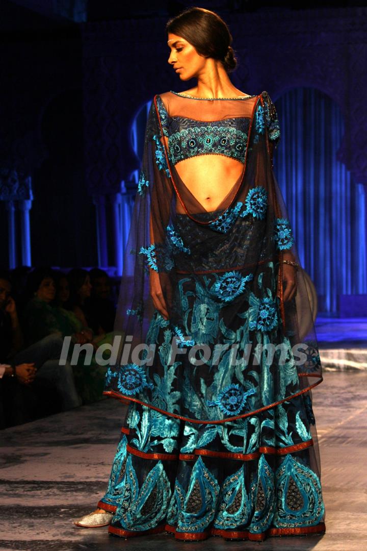 A model showcases a creation by designer JJ Valaya show at the Delhi Couture Week 2012, in New Delhi on Wednesday. .