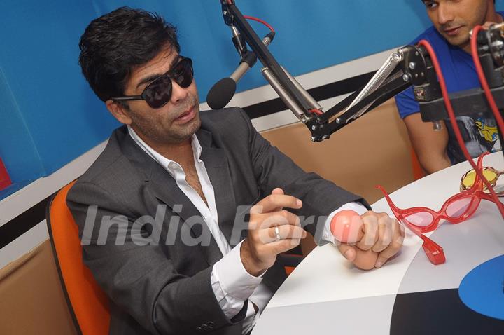 Bollywood director Karan Johar at Red FM and Radio Mirchi for Student Of The Year radio promotions. .