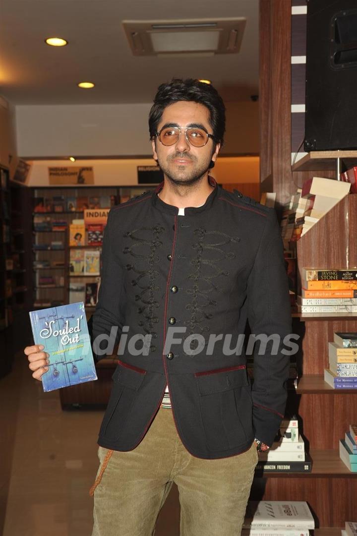 John Abraham unveiling the book of Ayushmann Khurrana Souled Out