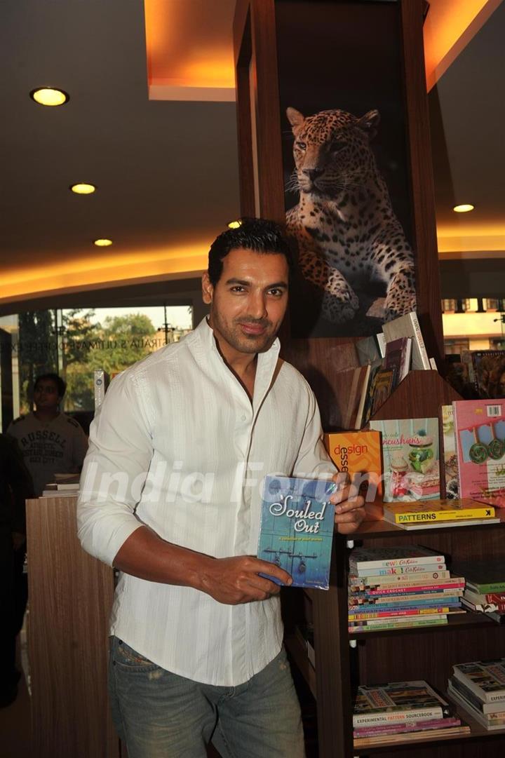 John Abraham unveiling the book of Ayushmann Khurrana Souled Out