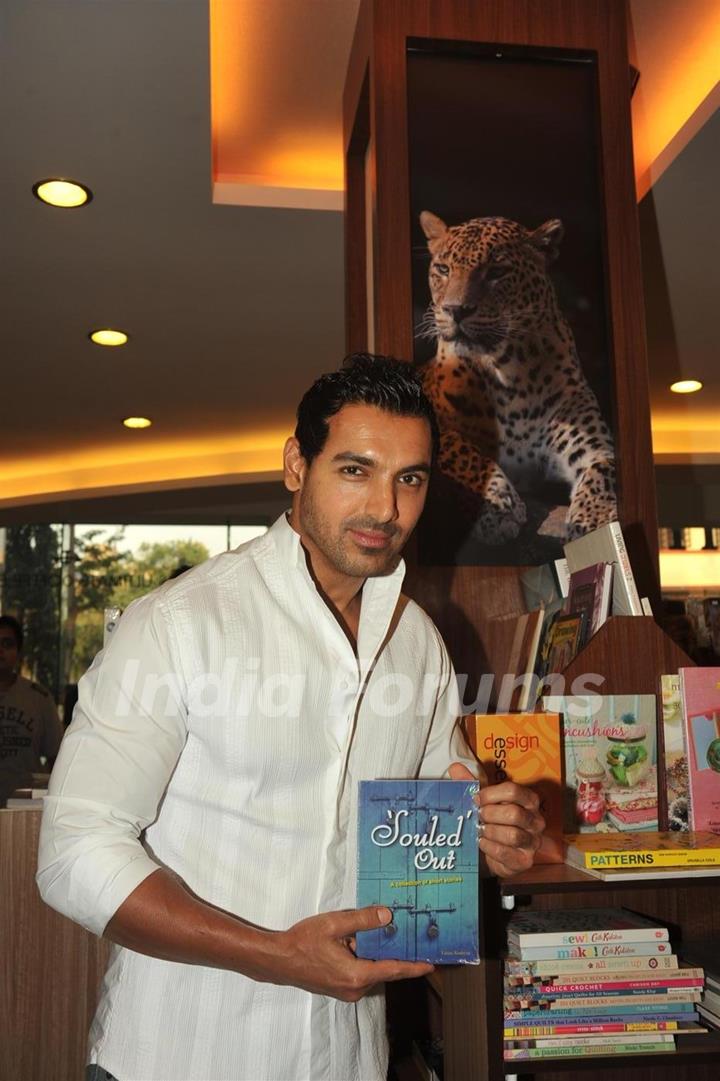 John Abraham unveiling the book of Ayushmann Khurrana Souled Out