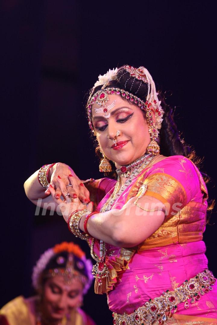 Hema Malini performs dance at North Bombay Sarbojanin Durga Puja Pandal at Hotel Tulip Star in Mumbai