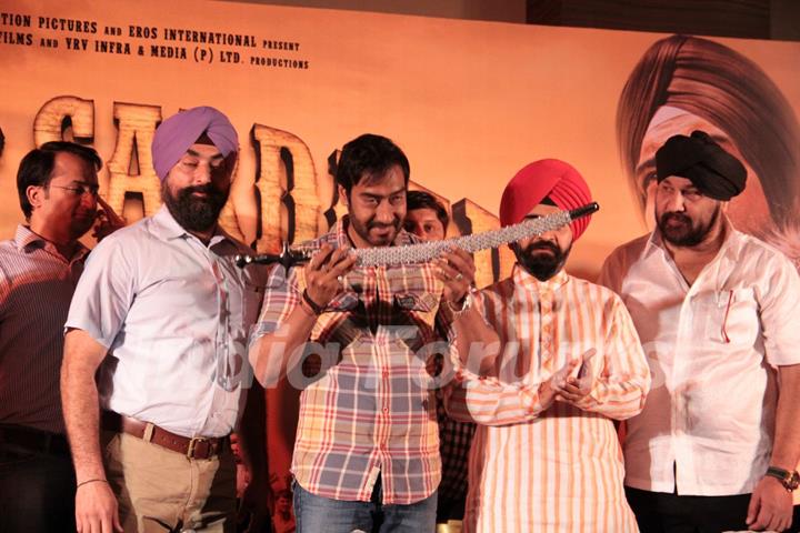 Bollywood actor Ajay Devgan with Congress leader Charan Singh Sapra and other members of Punjabi Cultural Heritage Board (PCHB) at Son Of Sardaar press meet to resolve issues with Sikh Community leaders at Hotel Novotel in Juhu, Mumbai.