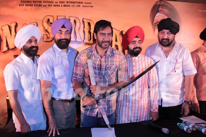 Bollywood actor Ajay Devgan with Congress leader Charan Singh Sapra and other members of Punjabi Cultural Heritage Board (PCHB) at Son Of Sardaar press meet to resolve issues with Sikh Community leaders at Hotel Novotel in Juhu, Mumbai.