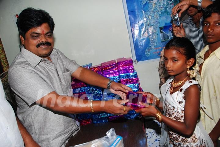 Shankar Nangre distributing Sweets and Fire Crackers to the underprivileged children