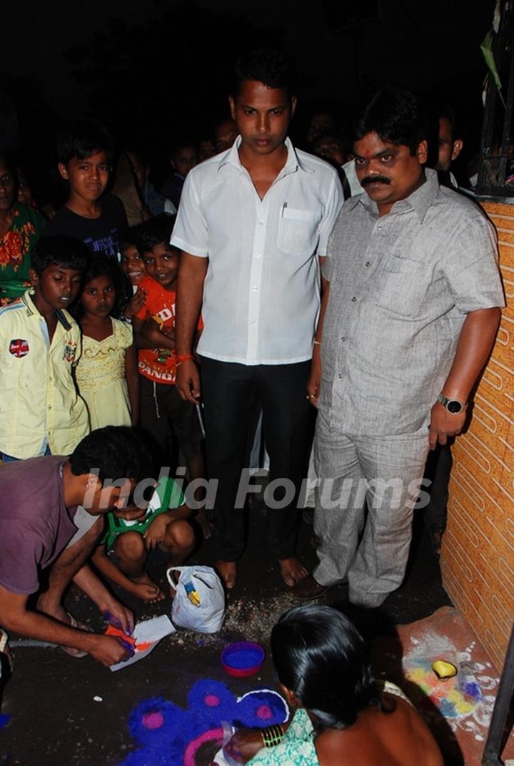 Shankar Nangre distributing Sweets and Fire Crackers to the underprivileged children