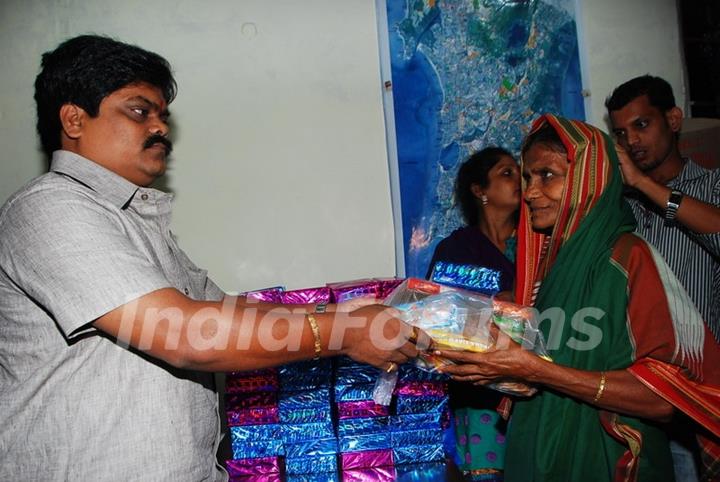 Shankar Nangre distributing Sweets and Fire Crackers to the underprivileged children