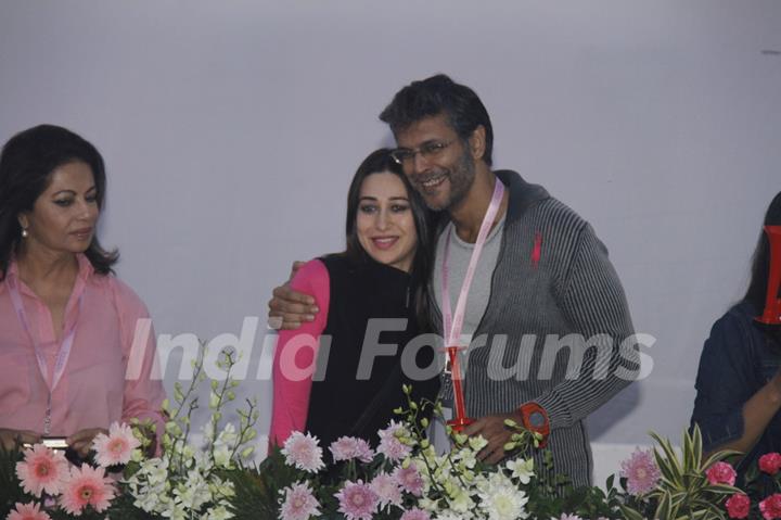 (L to R) Devika Bhojwani, bollywood actors Karisma Kapoor and Milind Soman at the first edition of Pinkathon International 10k women's run for breast cancer awareness at Bandra Kurla Complex in Mumbai.