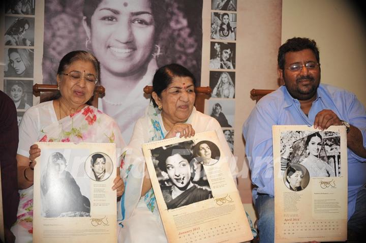Lata Mangeshkar with her sister and singer Usha Mangeshkar during the launch of her calendar Hamsafar 2013