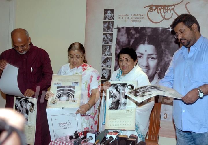 Lata Mangeshkar with her sister and singer Usha Mangeshkar during the launch of her calendar Hamsafar 2013