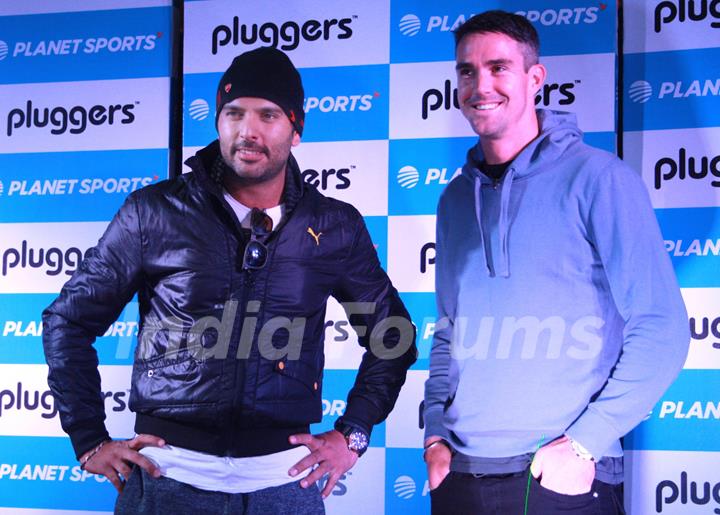 Yuvraj Singh with England cricketer Kevin Peterson at the launch of ''Pluggers'' in Planet Sports, New Delhi.