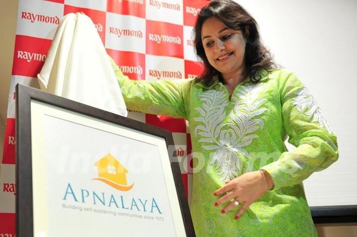 Anjali Tendulkar unveiling new logo of Apnalaya NGO at the 40th anniversary celebration of NGO Apnalaya in Mumbai.