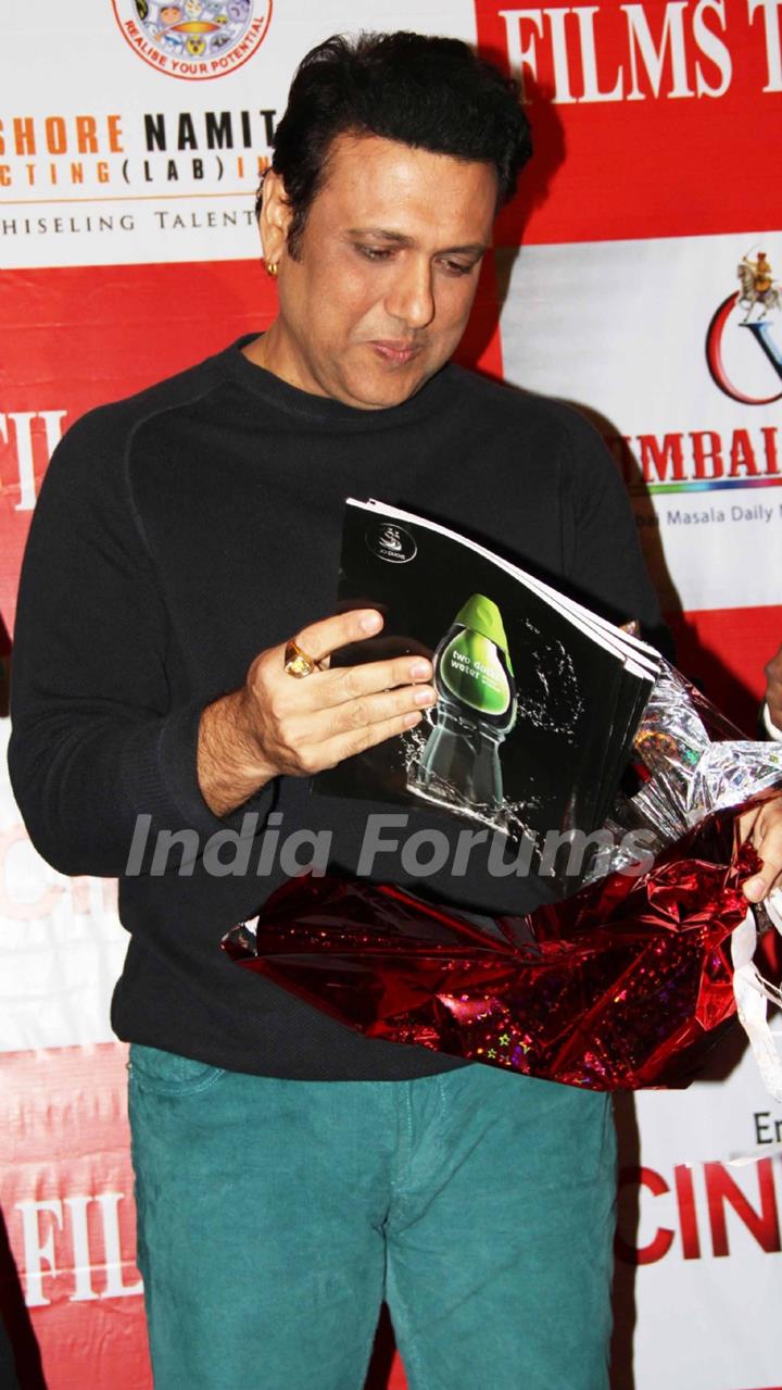 Bollywood actor Govinda with Rajesh Shrivastava, CMD, Films Today, filmmaker Raju Kariya during the launch of the 7th anniversary issue of 'Films Today' magazine in Mumbai.