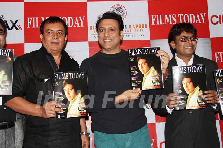 Bollywood actor Govinda with Rajesh Shrivastava, CMD, Films Today, filmmaker Raju Kariya during the launch of the 7th anniversary issue of 'Films Today' magazine in Mumbai.