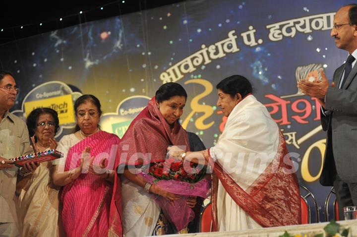 Asha Bhonsle and Lata Mangeshkar at Pandit Dinanath Mangeshkar Awards ceremony