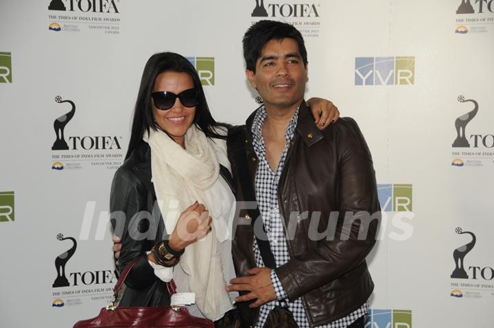 Neha Dhupia with Manish Malhotra arrive in Vancouver for TOIFA