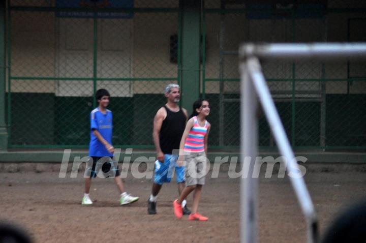 Aamir Khan playing football with his family