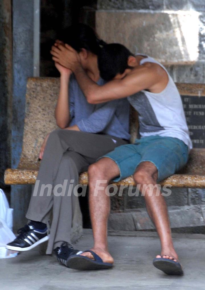 Family members of Bollywood actor Jiah Khan waiting at the hospital to receive her body in Mumbai