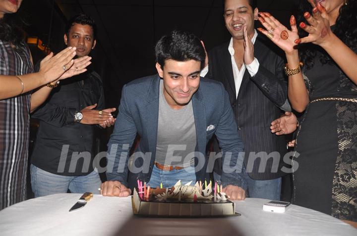 Birthday Boy Cuts His Cake